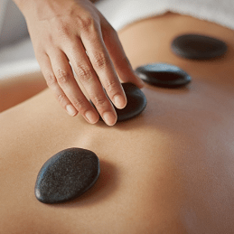 MASAJE PIEDRAS CALIENTES